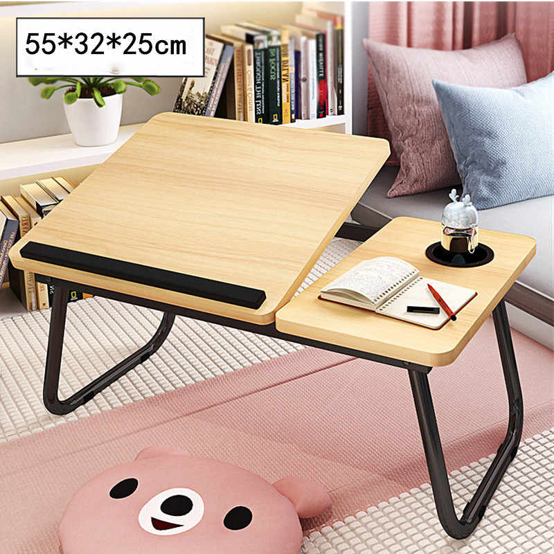 Mesa Portátil inclinable ideal para trabajar, estudiar de la cama o sofa. Pedilas online en Multiventas Uruguay.